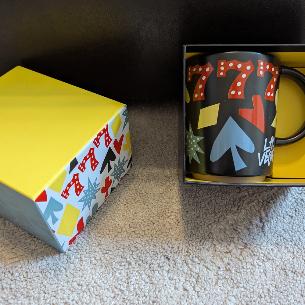 Las Vegas Themed Black Ceramic Mug with Colorful Icons